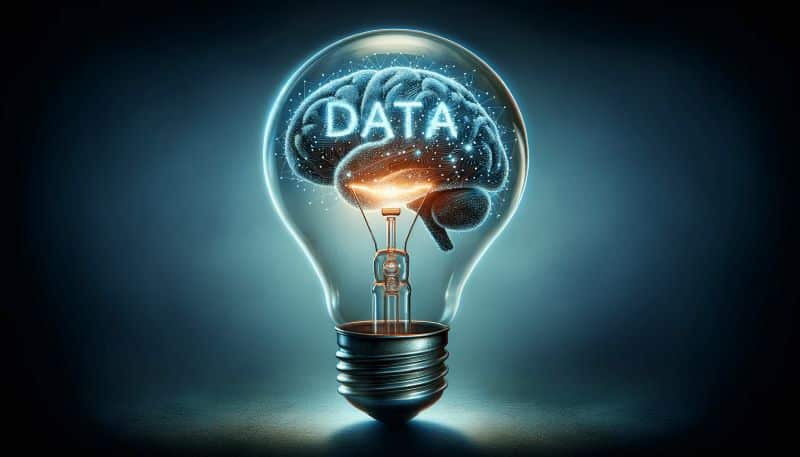 lustration numérique d'une ampoule avec un cerveau à l'intérieur et les mots 'DATA' et 'IA' intégrés, sur un fond bleu foncé